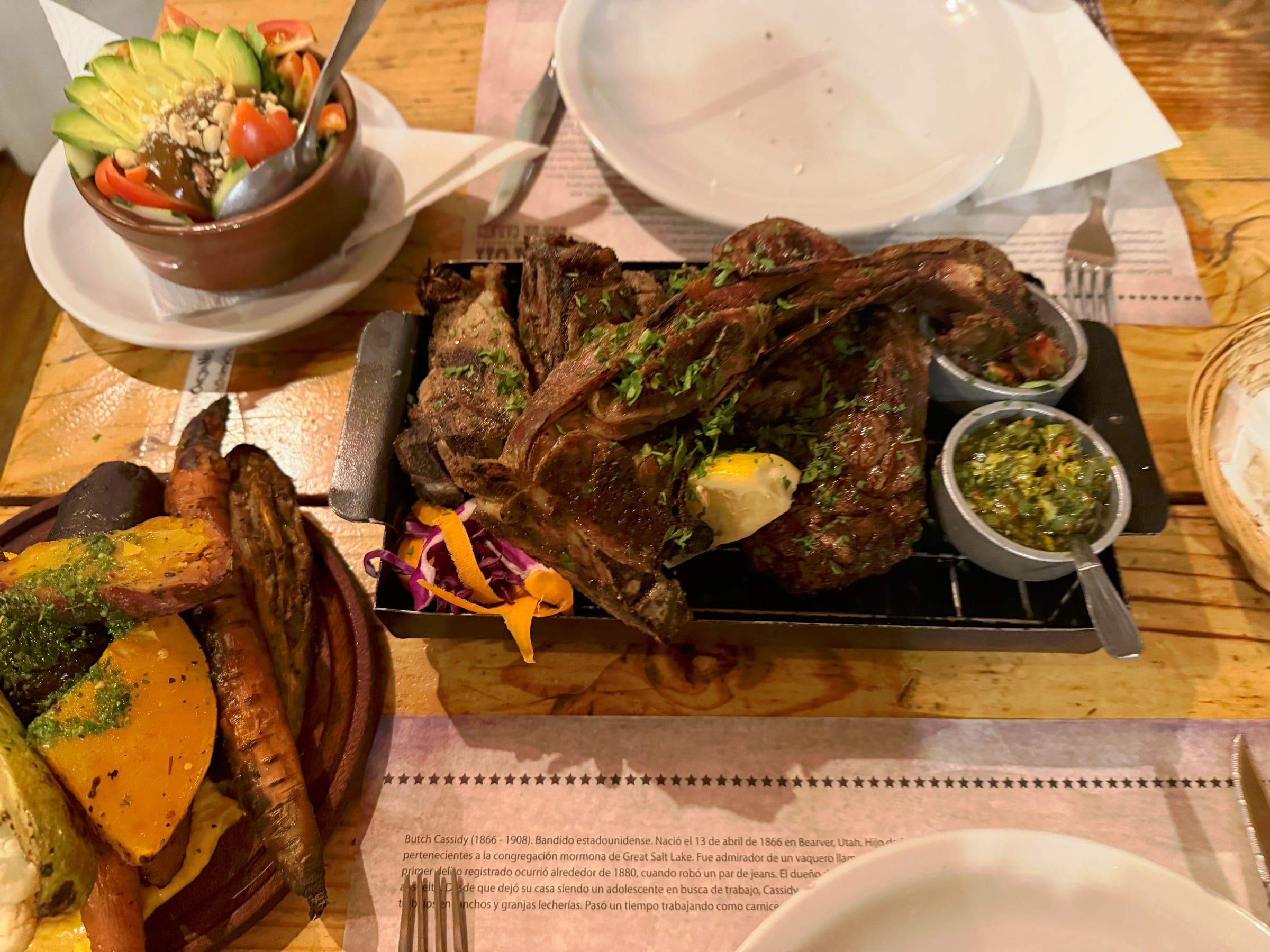 A parrilla spread: roasted lamb, chimichurri, roasted root vegetables